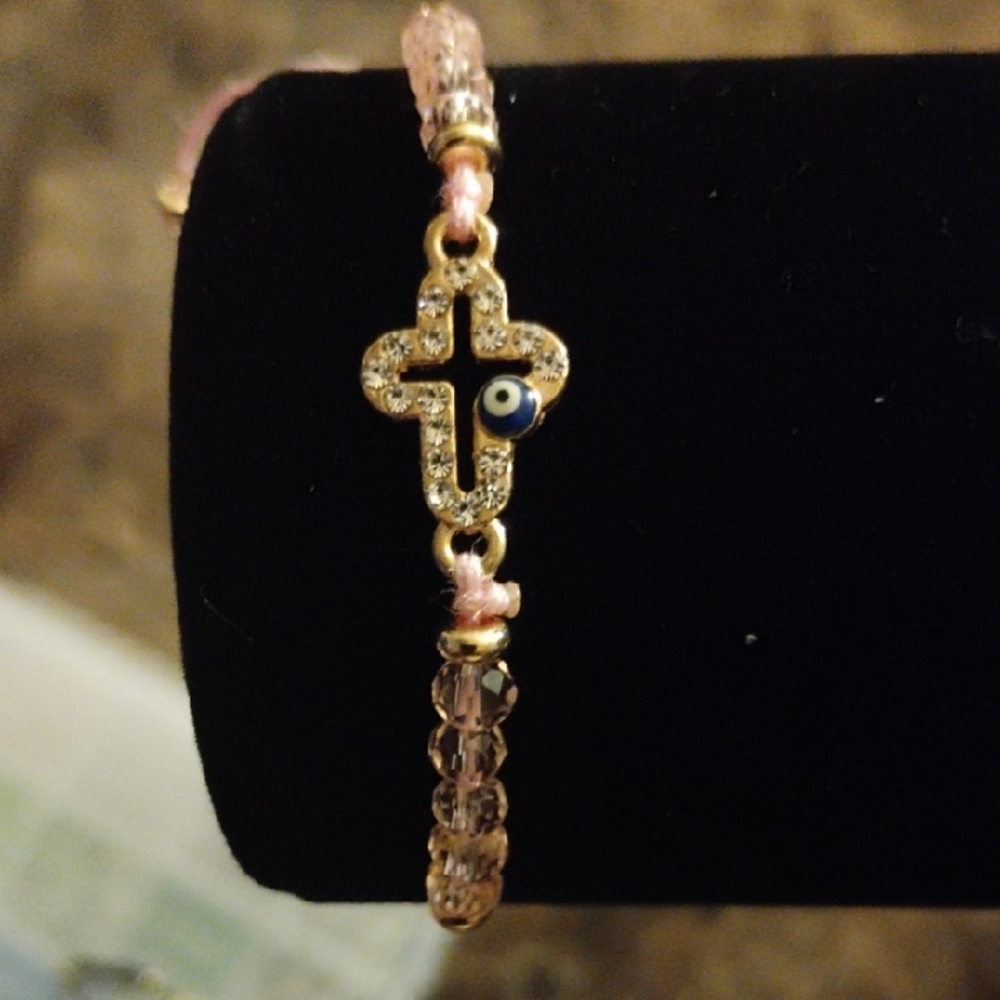 Elegant Gold and Pink Bracelet with Evil Eye Charm